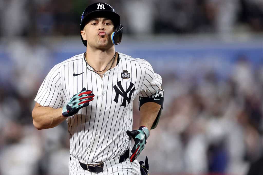 NEW YORK, NEW YORK - OCTOBER 30: Giancarlo Stanton #27 of the New York Yankees rounds the bases after hitting a solo home run during the third inning of Game Five of the 2024 World Series against the Los Angeles Dodgers at Yankee Stadium on October 30, 2024 in the Bronx borough of New York City.